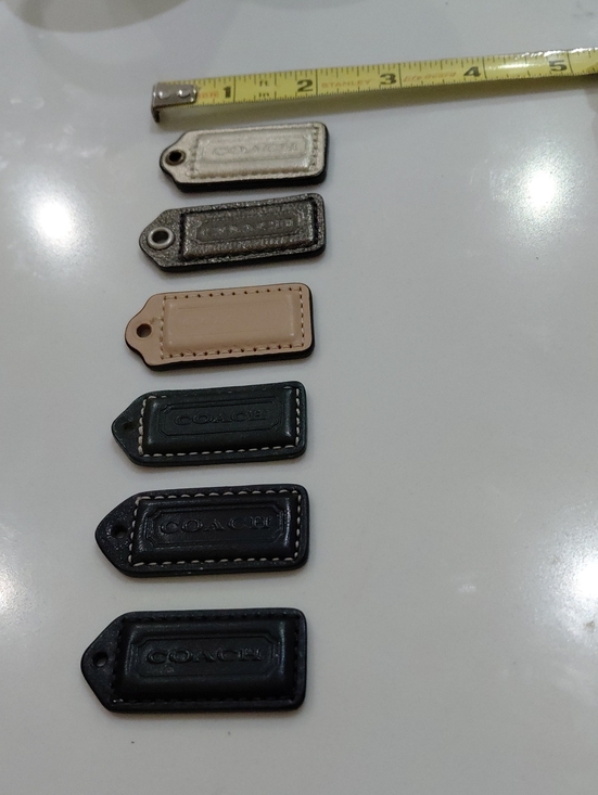 Coach Handbags - 6 Coach Small Hangtags, Browns,blacks,light Silver, Shiny Gray,light Tan